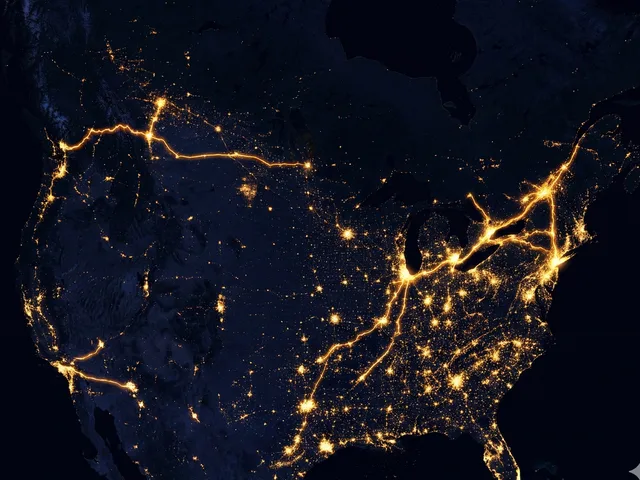 Satellite night view of North America showing land freight routes from Toronto to Montreal, Detroit, Chicago, New York, Calgary, and Vancouver
